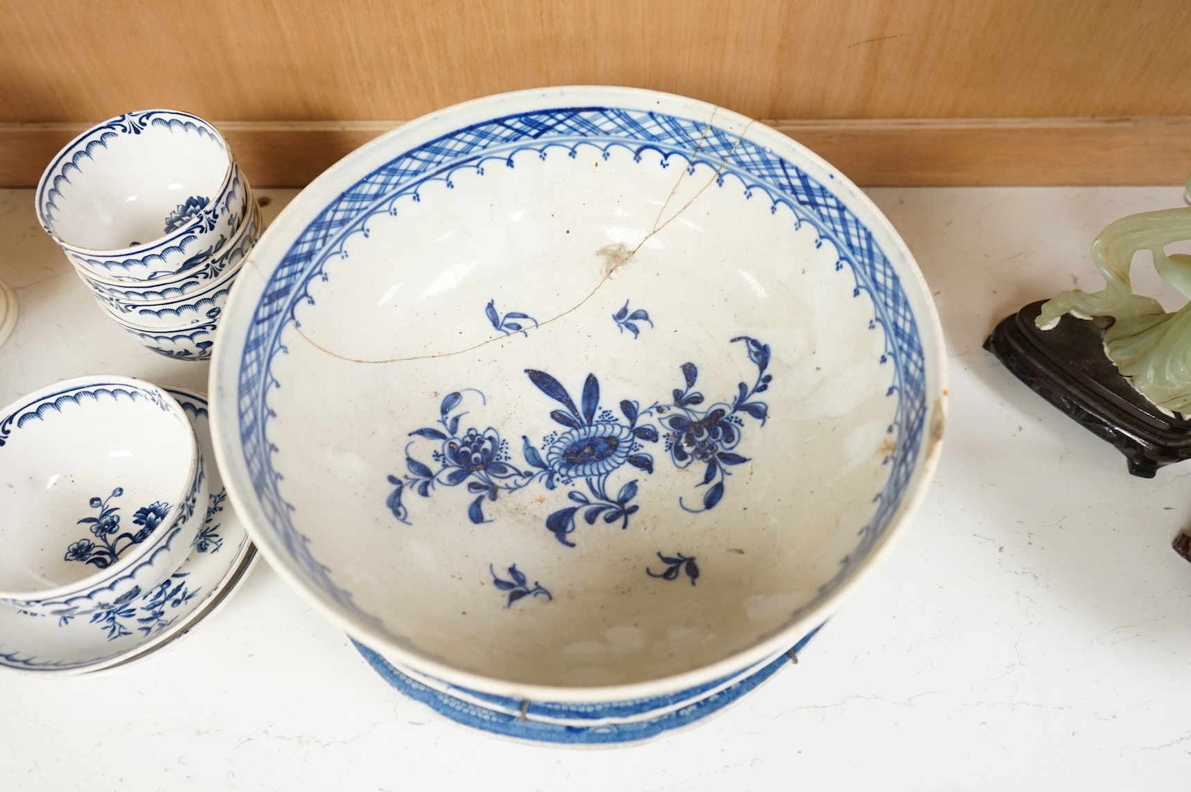 An 18th century blue and white Worcester jug and assorted Booths Worcester style tea wares, largest 24cm high